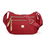 Multi-compartment shoulder bag